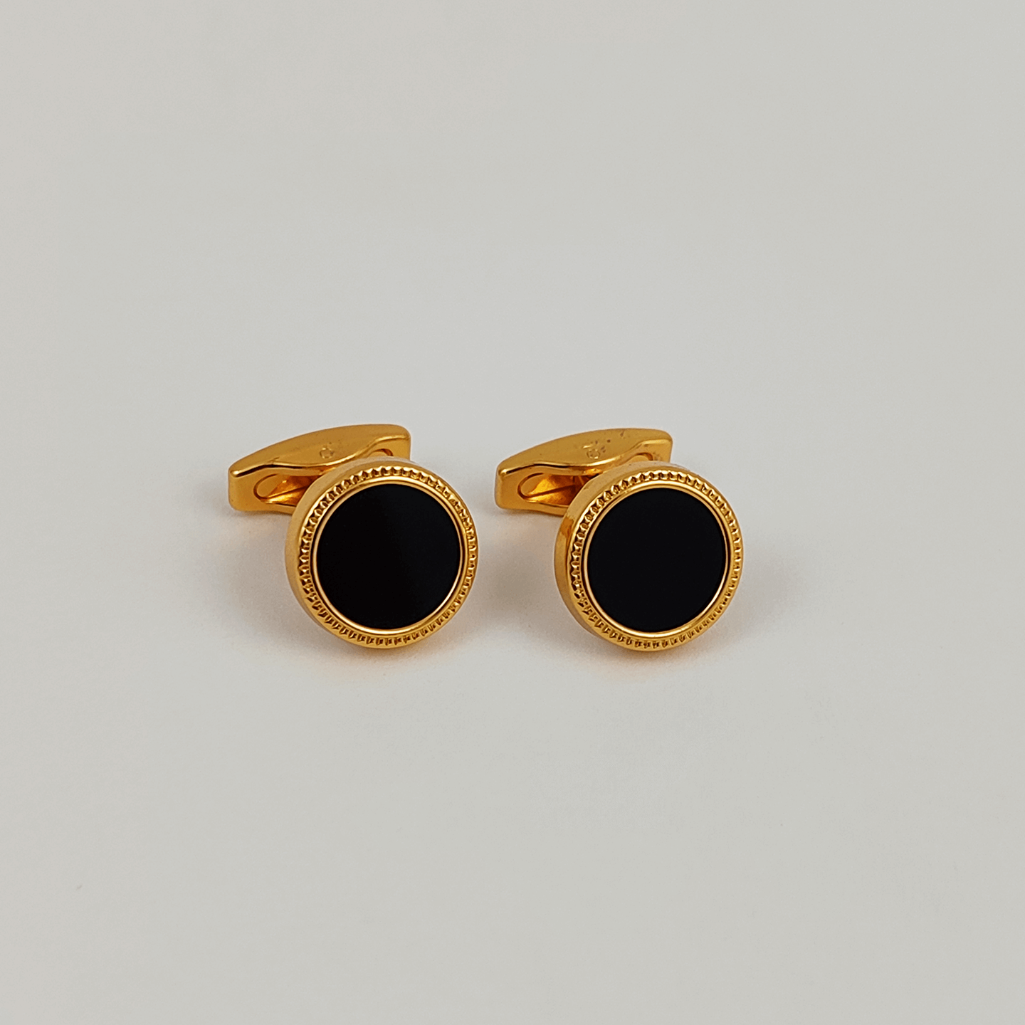 Elegant Golden and Black Cufflinks