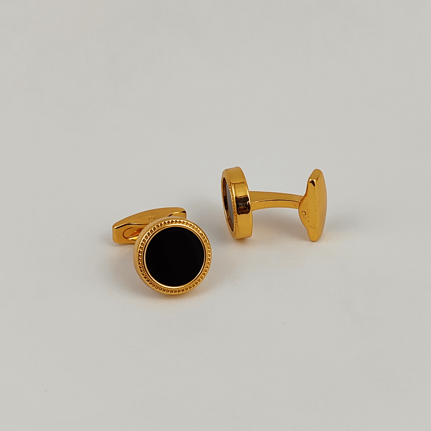 Elegant Golden and Black Cufflinks